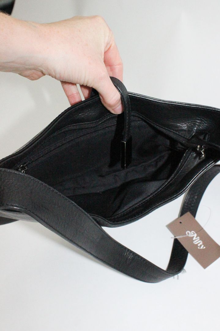 BAG, LLOYD BAKER